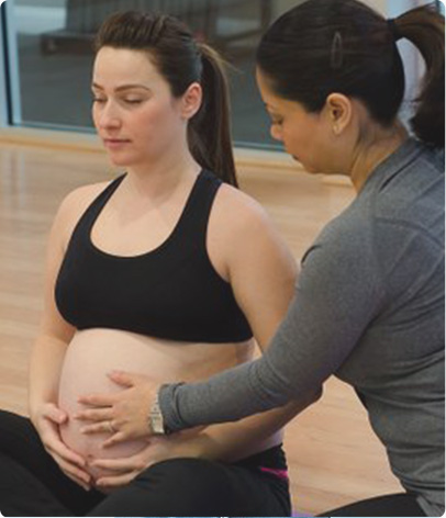 physical therapist giving patient a prenatal massage 